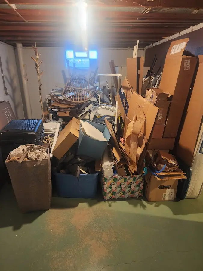 Roll-off dumpster container at job site for 20 Yard Dumpster Rental in Sandston